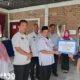 Wabup Pesisir Barat Serahkan Bantuan Perbankan Rumah Bagi Korban Bencana di Pekon Tembakak