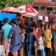 Serahkan Hadiah Motor ke Warga Way Kanan, TDM Lampung Bagikan Jajanan Gratis ke Masyarakat