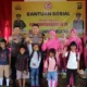 Sambut HUT Bhayangkara ke-78, Polres Lampung Selatan Bagikan Alat Sekolah ke Pelajar di Ketapang
