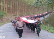 Memperingati HUT RI ke-79, Polresta dan Kodim Bandar Lampung Gelar Kirab dengan Bendera 79 Meter di Bukit Aslan