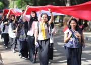 Meriahkan Dies Natalis ke-59, Mahasiswa Unila Gelar Kirab Bendera Merah Putih Sepanjang 2,5 Km