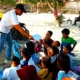 Ni Hao Ma...Begini Cara Anggota Sat Polair Lampung Selatan Ajarkan Bahasa Mandarin untuk Anak Pesisir