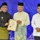 Gubernur Lampung Terima Penghargaan Bergengsi Tun Perak di Forum DMDI