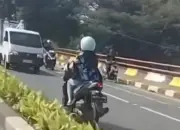 Viral Pemotor Wanita Lawan Arah di Depok, Polisi Kejar Pengendara Berpelat BK 14 Viral di Medsos, Pengendara Motor Wanita Lawan Arah di Depok Diburu Polisi